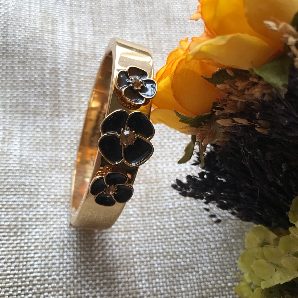 Spade goldtone flower  bracelet
